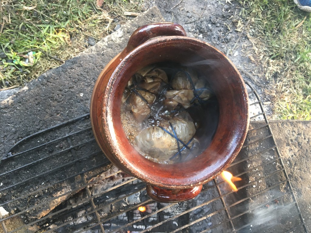 Camp meal cooking over the fire