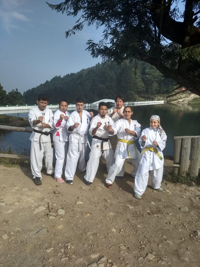 Practitioners by the reservoir during the 2018 winter camp