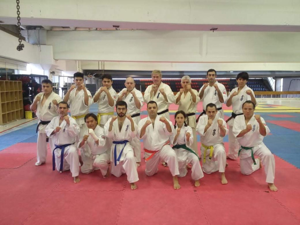 Instructors and students in kamae at the end of the session